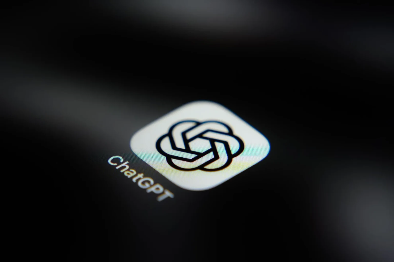 The ChatGPT application icon is displayed on a smartphone screen.